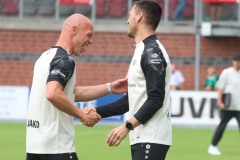 Testspiel Eintracht Rheine - Preußen Münster. Torwarttrainer Andre Poggenborg mit Trainer Thomas Wörle.